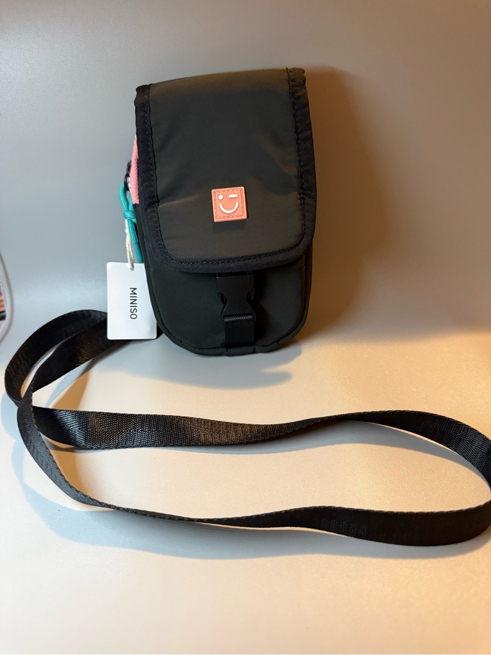 MINISO Black Crossbody Pouch with Pink & Teal Accents 🖤